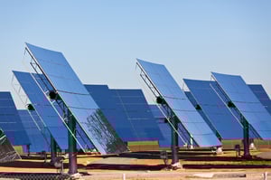 solar-panels-on-bright-blue-sky-background-2024-12-16-05-51-23-utc